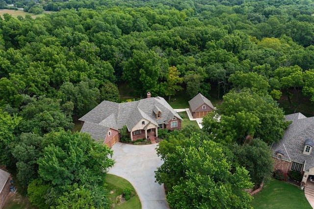 1918 Winding Ridge Rd, Edmond, OK 73034 - aerial view of property and surrounding area with a heavily wooded area