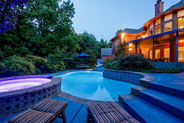 1918 Winding Ridge Rd, Edmond, OK 73034 - view of pool with a patio and a pool with connected hot tub