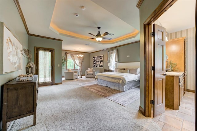 1918 Winding Ridge Rd, Edmond, OK 73034 - bedroom with a raised ceiling, crown molding, a chandelier, and light carpet