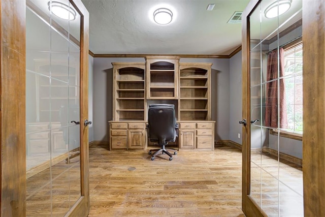 1918 Winding Ridge Rd, Edmond, OK 73034 - unfurnished office featuring french doors, ornamental molding, light wood finished floors, and healthy amount of natural light