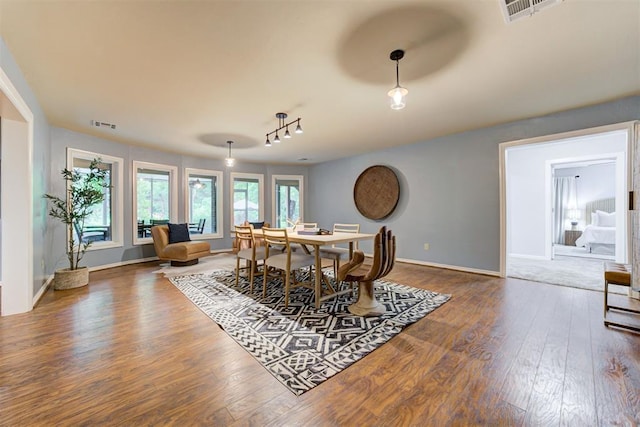 1918 Winding Ridge Rd, Edmond, OK 73034 - dining space with wood finished floors and baseboards