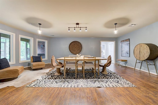 1918 Winding Ridge Rd, Edmond, OK 73034 - dining room featuring baseboards and wood finished floors