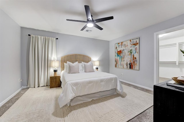 1918 Winding Ridge Rd, Edmond, OK 73034 - bedroom with carpet and ceiling fan