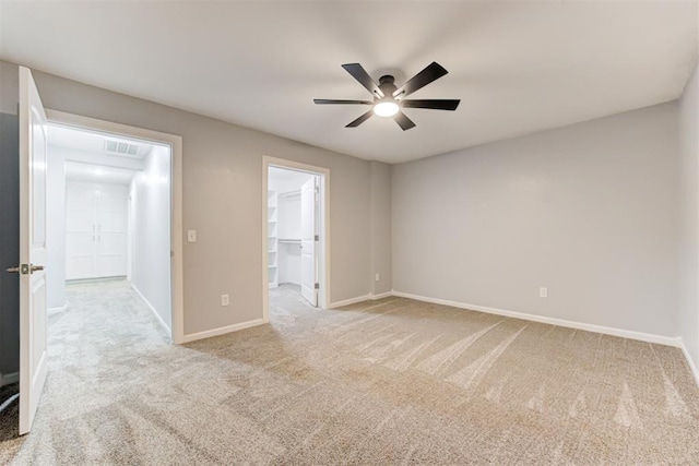 1918 Winding Ridge Rd, Edmond, OK 73034 - carpeted empty room featuring ceiling fan and baseboards