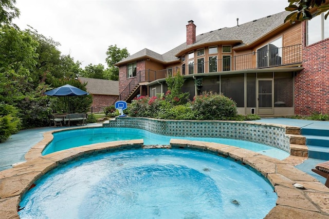 1918 Winding Ridge Rd, Edmond, OK 73034 - view of pool featuring a pool with connected hot tub and stairway