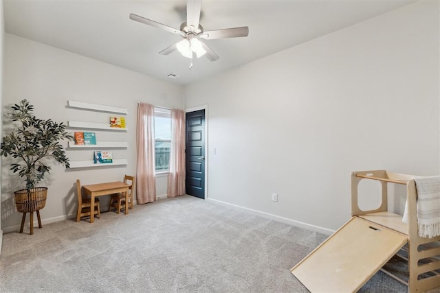 18813 Windy Way Rd, Edmond, OK 73012 - living area with baseboards, ceiling fan, and carpet flooring
