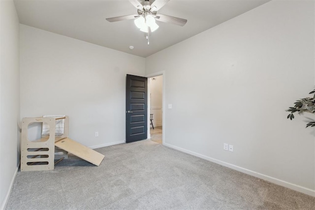 18813 Windy Way Rd, Edmond, OK 73012 - carpeted empty room with baseboards and a ceiling fan