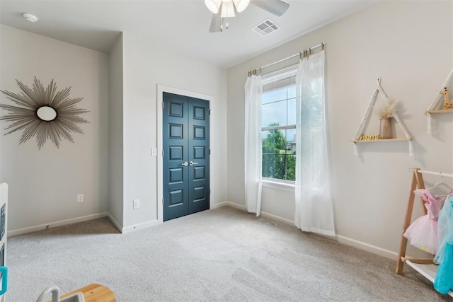 18813 Windy Way Rd, Edmond, OK 73012 - recreation room featuring carpet, ceiling fan, and baseboards
