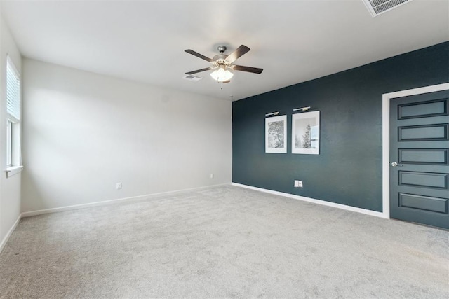 18813 Windy Way Rd, Edmond, OK 73012 - spare room with ceiling fan, carpet flooring, and baseboards