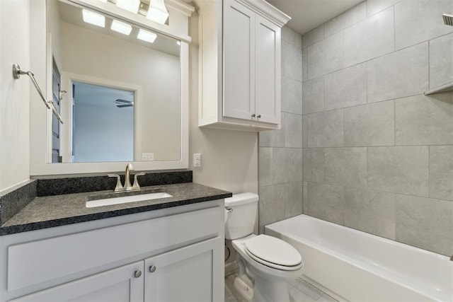 18813 Windy Way Rd, Edmond, OK 73012 - bathroom featuring toilet, vanity, and shower / washtub combination