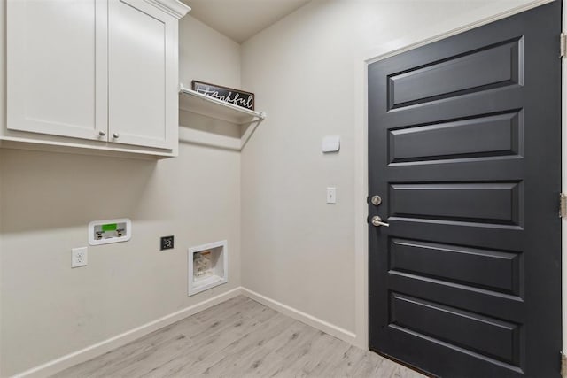 18813 Windy Way Rd, Edmond, OK 73012 - laundry area with washer hookup, light wood-style flooring, hookup for an electric dryer, baseboards, and cabinet space