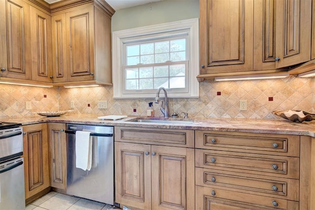 2721 NW 45th St, Oklahoma City, OK 73112 - kitchen with stainless steel dishwasher, stove, backsplash, and light stone counters