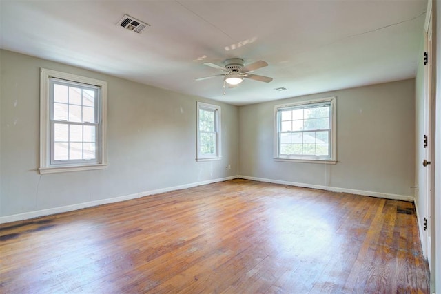 2721 NW 45th St, Oklahoma City, OK 73112 - unfurnished room featuring hardwood / wood-style flooring and ceiling fan