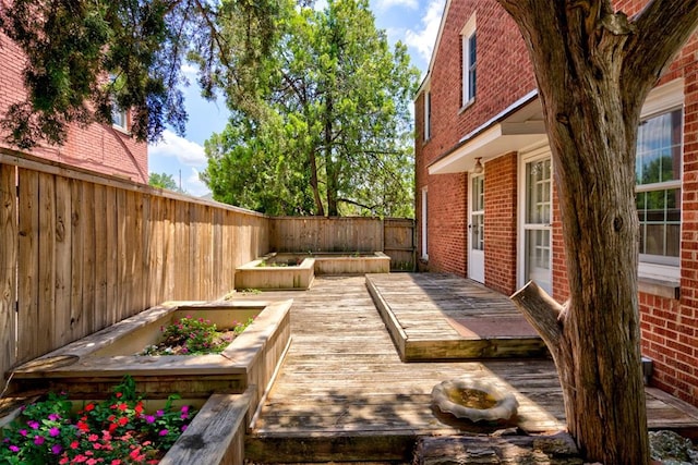 2721 NW 45th St, Oklahoma City, OK 73112 - deck with a fenced backyard