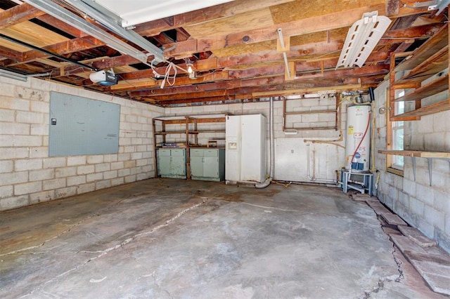 2721 NW 45th St, Oklahoma City, OK 73112 - garage featuring water heater, a garage door opener, and concrete block wall