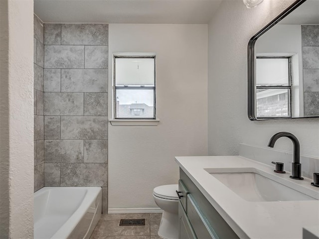 4709 Wilcox Ln, Yukon, OK 73099 - full bathroom featuring toilet, vanity, tile patterned floors, and baseboards