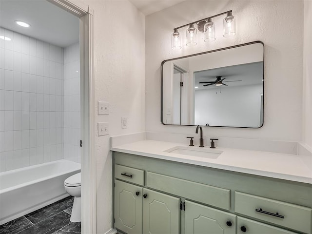 4709 Wilcox Ln, Yukon, OK 73099 - bathroom featuring vanity, toilet, ceiling fan, shower / bathtub combination, and a textured wall