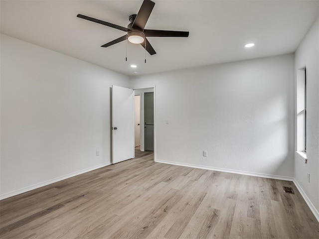 4709 Wilcox Ln, Yukon, OK 73099 - empty room featuring ceiling fan, wood finished floors, baseboards, and recessed lighting