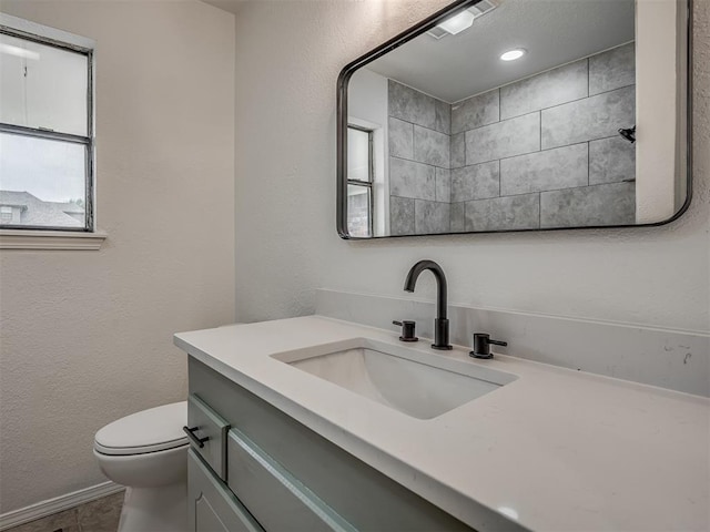4709 Wilcox Ln, Yukon, OK 73099 - bathroom featuring vanity and toilet