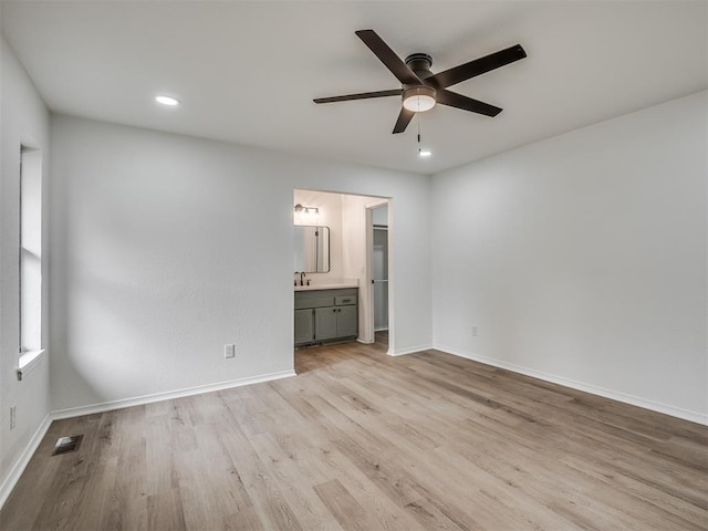 4709 Wilcox Ln, Yukon, OK 73099 - spare room featuring a ceiling fan, wood finished floors, baseboards, and recessed lighting