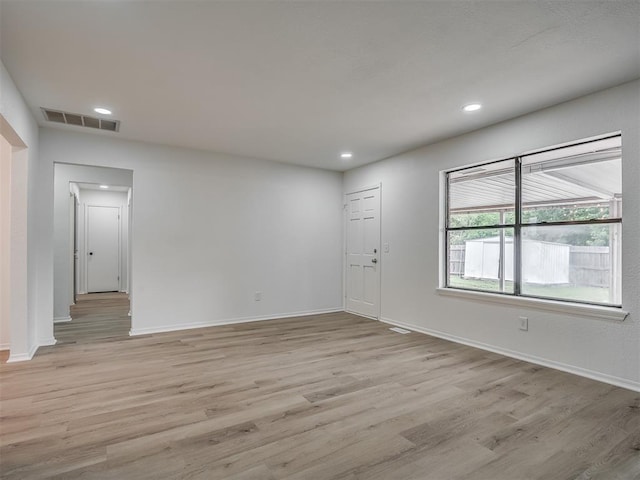 4709 Wilcox Ln, Yukon, OK 73099 - unfurnished room featuring light wood-style floors, baseboards, and recessed lighting