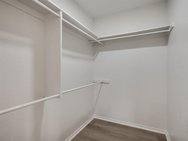 4709 Wilcox Ln, Yukon, OK 73099 - spacious closet with wood finished floors
