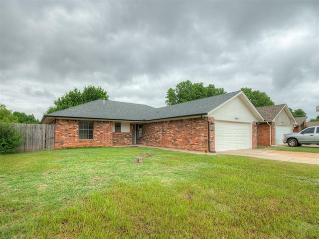 4709 Wilcox Ln, Yukon, OK 73099 - ranch-style home featuring a garage, brick siding, concrete driveway, and a shingled roof