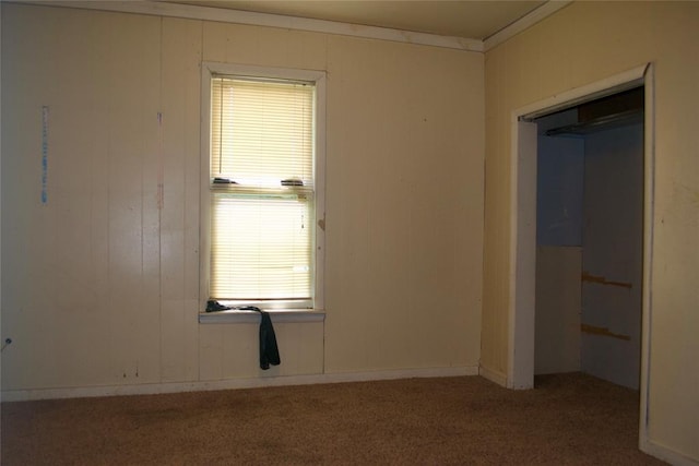 1014 S Dewey Ave, Chandler, OK 74834 - unfurnished bedroom featuring carpet flooring and multiple windows