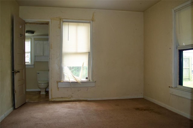 1014 S Dewey Ave, Chandler, OK 74834 - carpeted spare room with baseboards