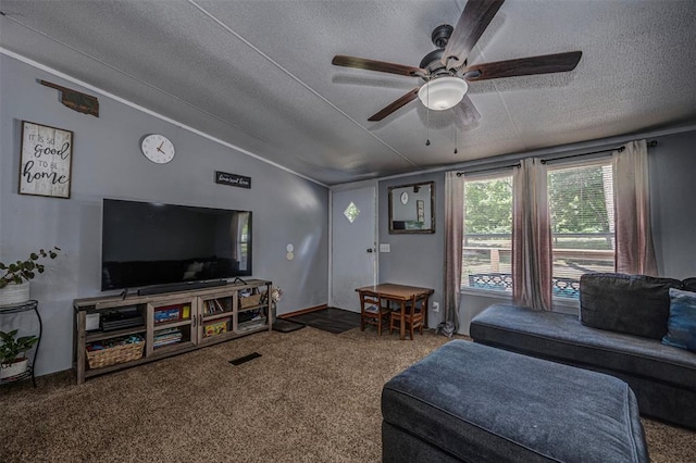 13903 Pleasant Ridge Rd, Jones, OK 73049 - carpeted living area with a textured ceiling, vaulted ceiling, and a ceiling fan