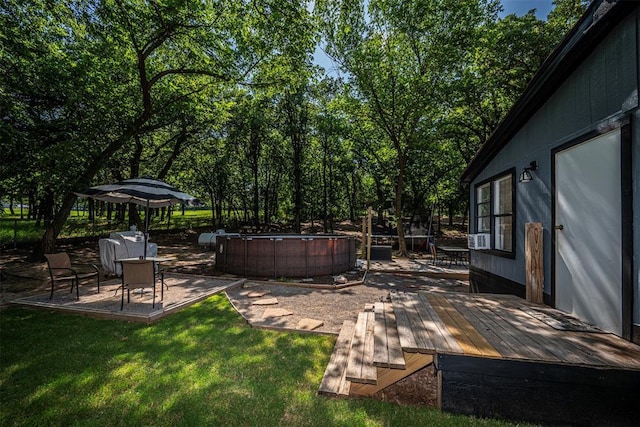 13903 Pleasant Ridge Rd, Jones, OK 73049 - view of grassy yard with a deck, a patio area, and a jacuzzi