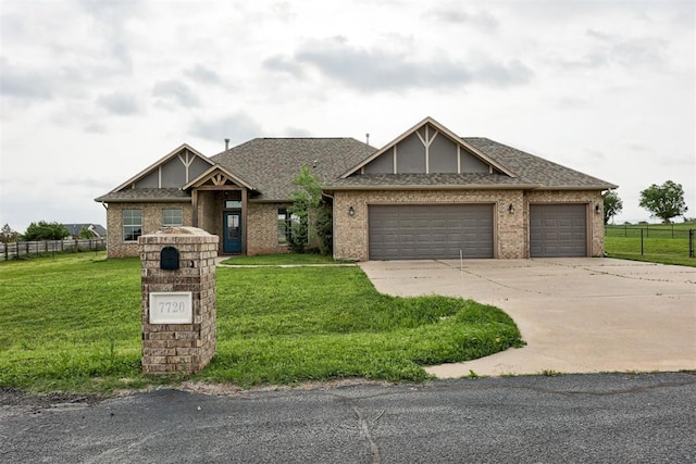 7720 Hawk Ln, Guthrie, OK 73044 - view of front of house featuring an attached garage, concrete driveway, a shingled roof, and brick siding