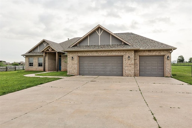 7720 Hawk Ln, Guthrie, OK 73044 - view of front of property featuring concrete driveway, a garage, brick siding, and roof with shingles