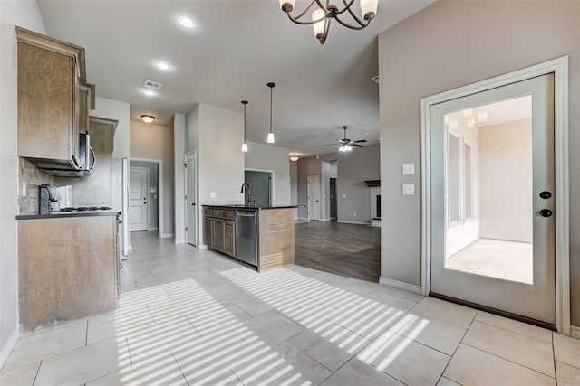 7720 Hawk Ln, Guthrie, OK 73044 - kitchen featuring dishwasher, open floor plan, ceiling fan, baseboards, and recessed lighting
