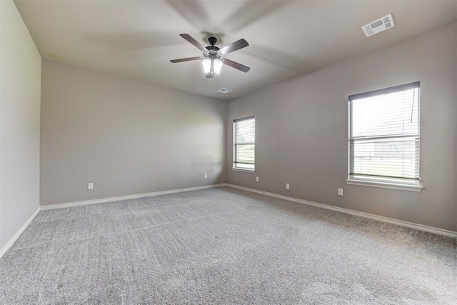 7720 Hawk Ln, Guthrie, OK 73044 - unfurnished room with a ceiling fan, carpet, and baseboards