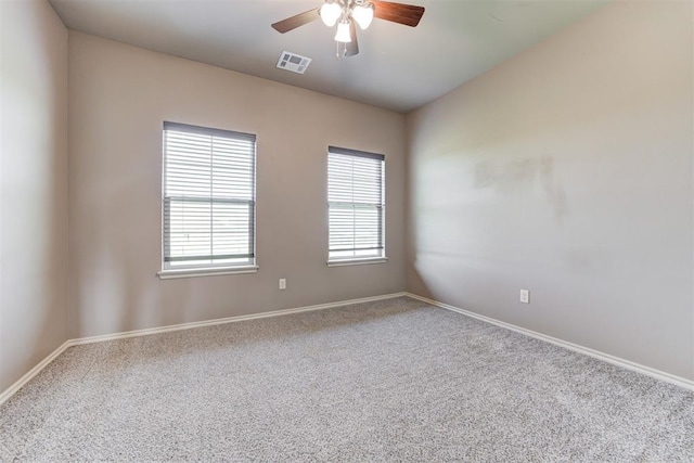 7720 Hawk Ln, Guthrie, OK 73044 - carpeted spare room with a ceiling fan and baseboards