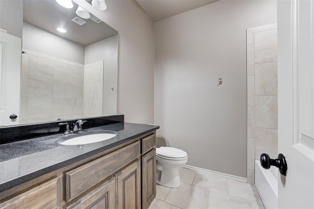 7720 Hawk Ln, Guthrie, OK 73044 - bathroom featuring vanity, toilet, tile patterned flooring, a bath, and baseboards