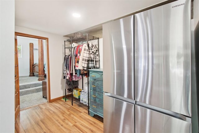 21306 E 10th St, Hinton, OK 73047 - walk in closet featuring light wood-type flooring