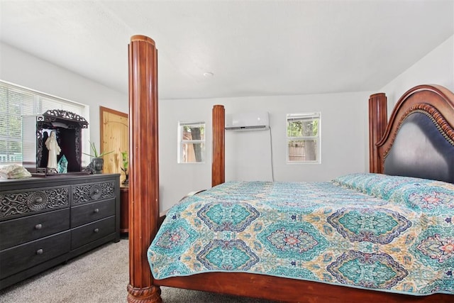 21306 E 10th St, Hinton, OK 73047 - carpeted bedroom with a wall mounted air conditioner