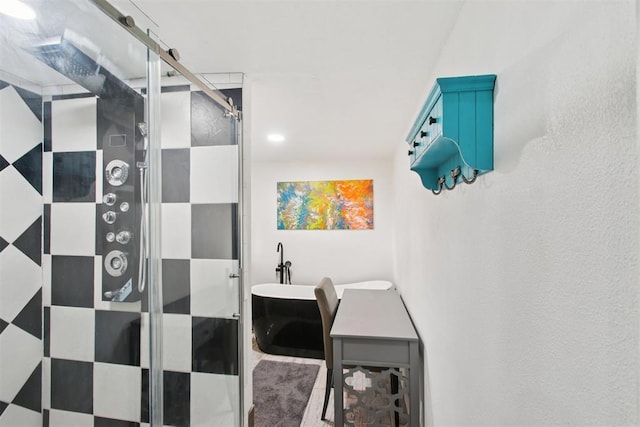 21306 E 10th St, Hinton, OK 73047 - bathroom featuring a shower stall and a freestanding bath