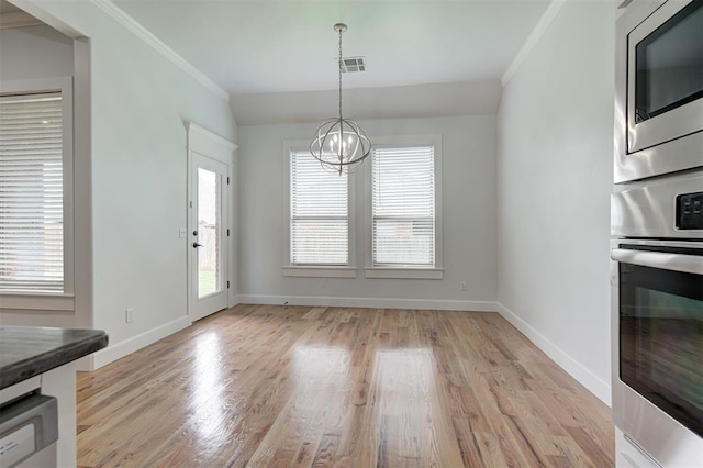 1108 Samantha Ln, Oklahoma City, OK 73160 - unfurnished dining area featuring light wood-type flooring, a chandelier, baseboards, and ornamental molding