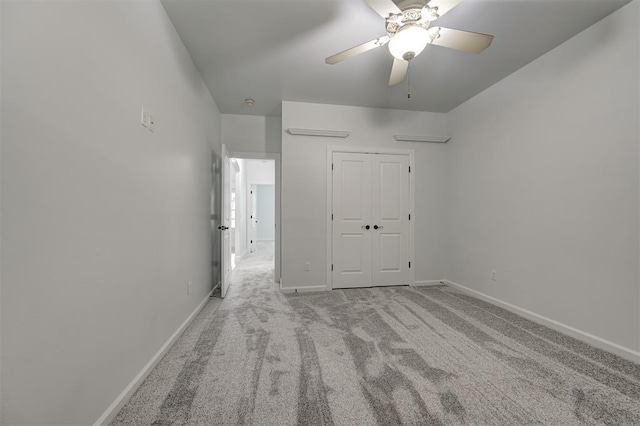 1108 Samantha Ln, Oklahoma City, OK 73160 - unfurnished bedroom featuring carpet floors, baseboards, a ceiling fan, and a closet