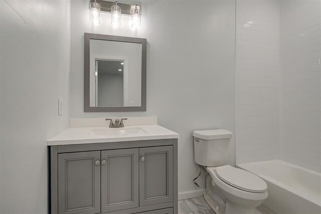 1108 Samantha Ln, Oklahoma City, OK 73160 - full bathroom with vanity, toilet, baseboards, and shower / bath combination