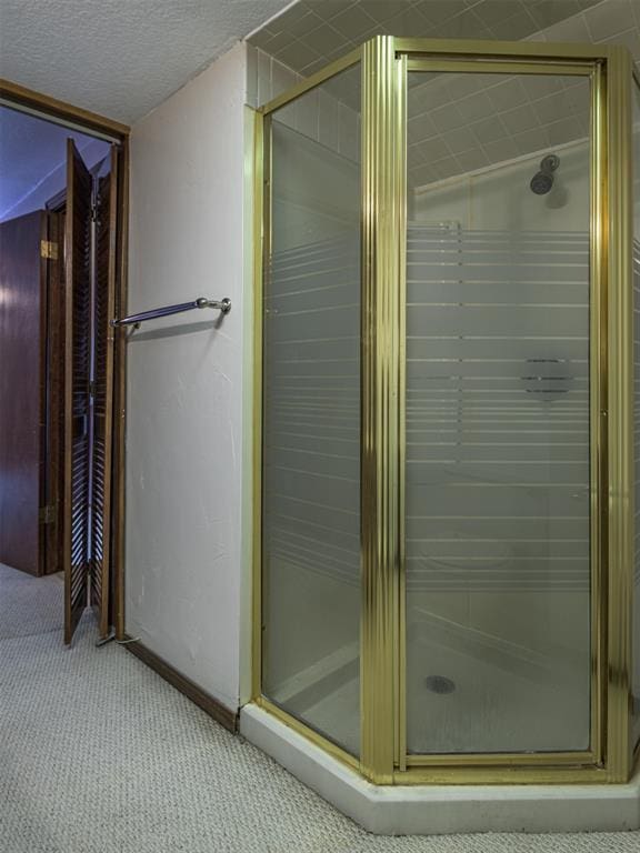13501 Fox Hollow Rdg, Oklahoma City, OK 73131 - bathroom featuring a shower stall and baseboards
