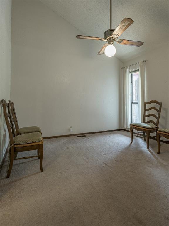 13501 Fox Hollow Rdg, Oklahoma City, OK 73131 - unfurnished room with light colored carpet, a ceiling fan, baseboards, and a textured ceiling