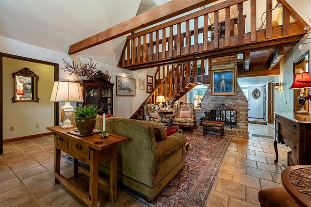 3824 Smoking Oaks Dr, Oklahoma City, OK 73150 - living room with baseboards, stone tile floors, stairs, and beam ceiling