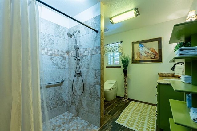 3824 Smoking Oaks Dr, Oklahoma City, OK 73150 - full bathroom with vanity, tiled shower, toilet, and baseboards