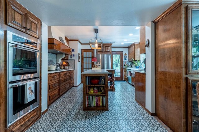 3824 Smoking Oaks Dr, Oklahoma City, OK 73150 - kitchen with appliances with stainless steel finishes, light countertops, open shelves, backsplash, and a center island