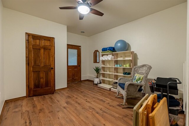 3824 Smoking Oaks Dr, Oklahoma City, OK 73150 - sitting room featuring wood finished floors, ceiling fan, and baseboards