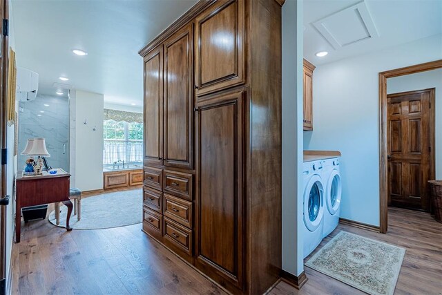 3824 Smoking Oaks Dr, Oklahoma City, OK 73150 - laundry room featuring cabinet space, separate washer and dryer, wood finished floors, attic access, and recessed lighting